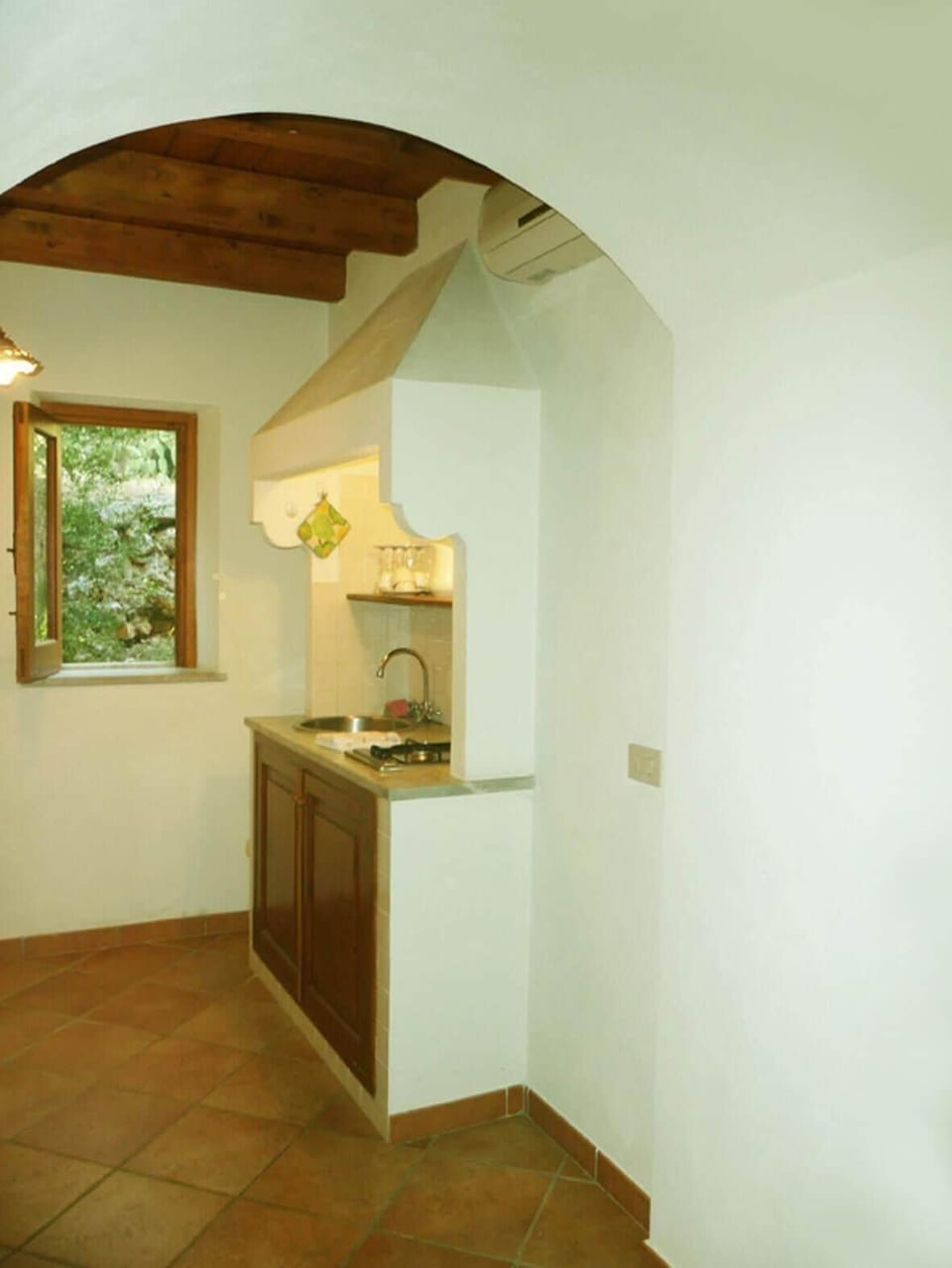 Kitchen area. - with window looking at the garden