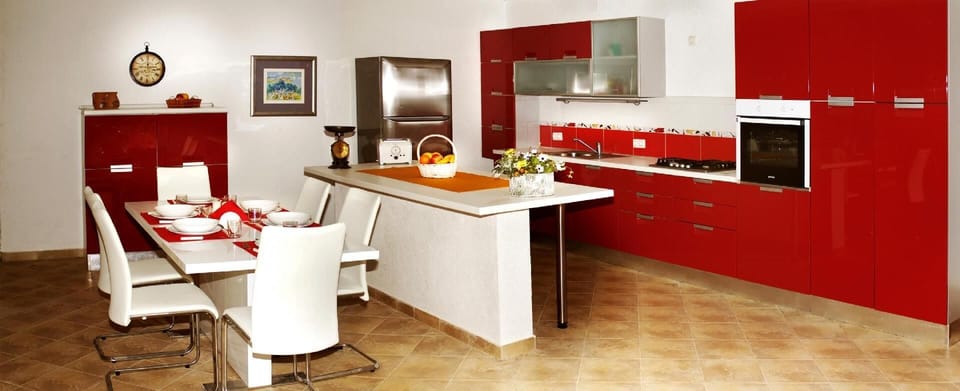 Fully fitted open plan kitchen and breakfast bar on the ground floor