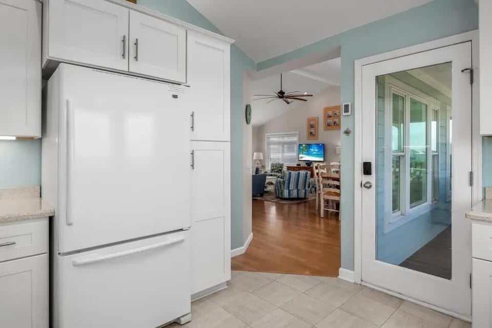 View from kitchen to dining area and living room
