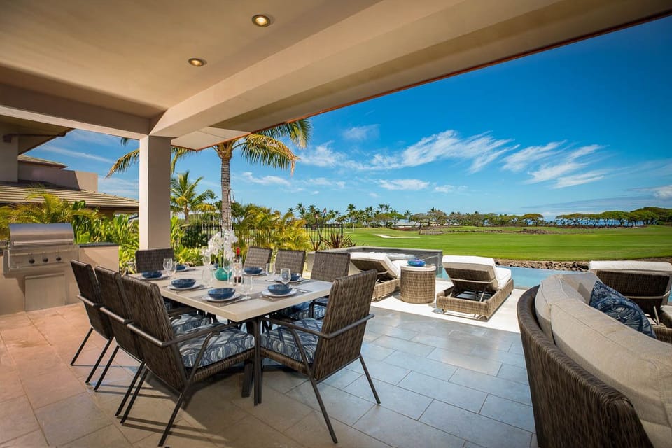 Unwind under the stars at your private infinity-edge pool and spa, overlooking breathtaking fairway and ocean views.