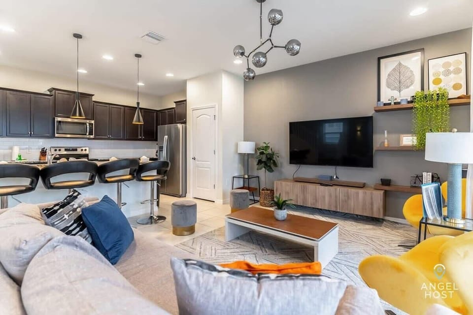Unwind after theme park adventures in this ample living room.