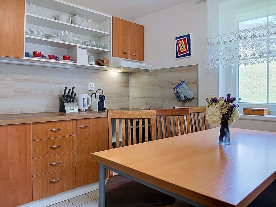 Furniture, Cabinetry, Flooring, Kitchen, Countertop, Wood, Interior Design, Kitchen Appliance, Floor, Cupboard