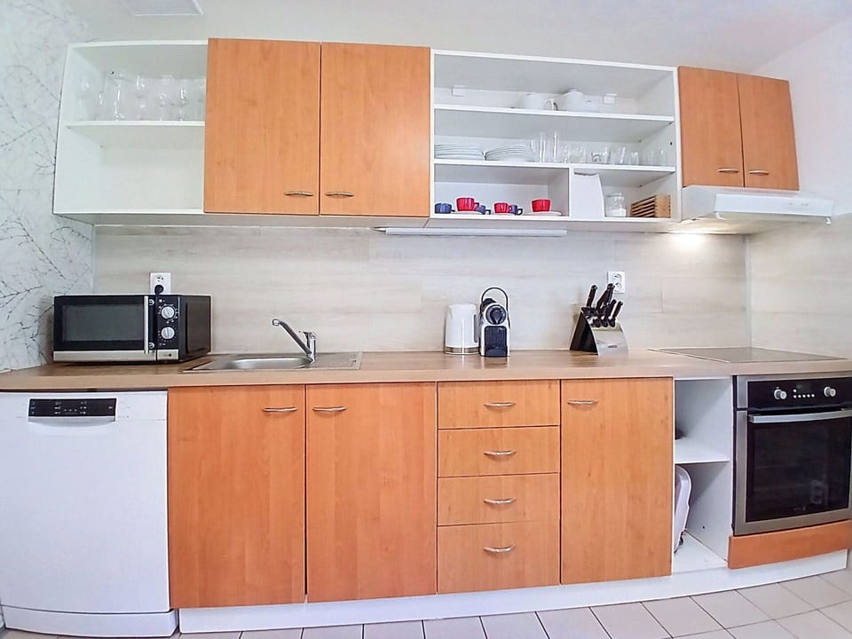 Cabinetry, Countertop, Furniture, Kitchen, Wood, Kitchen Appliance, Flooring, Major Appliance, Cupboard, Interior Design