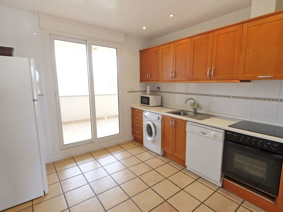 Property, Room, Kitchen, Furniture, Cabinetry, Major Appliance, Countertop, Building, Floor, Real Estate
