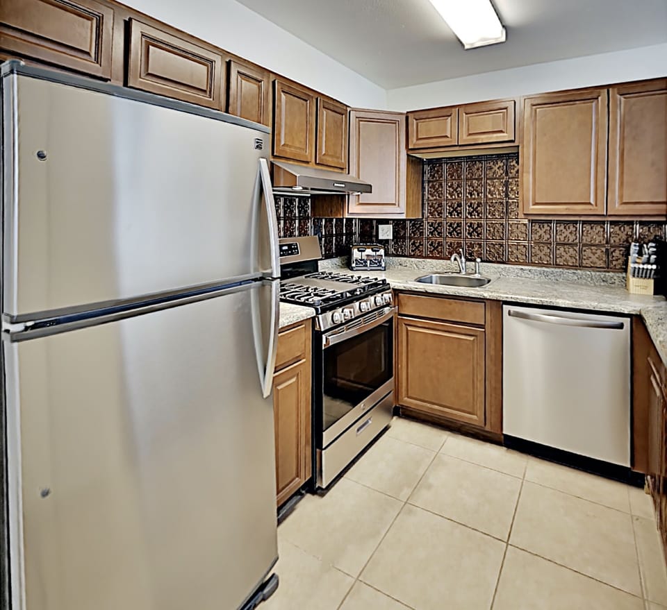 Enjoy a homecooked meal with everything you could need supplied in the condo kitchen.