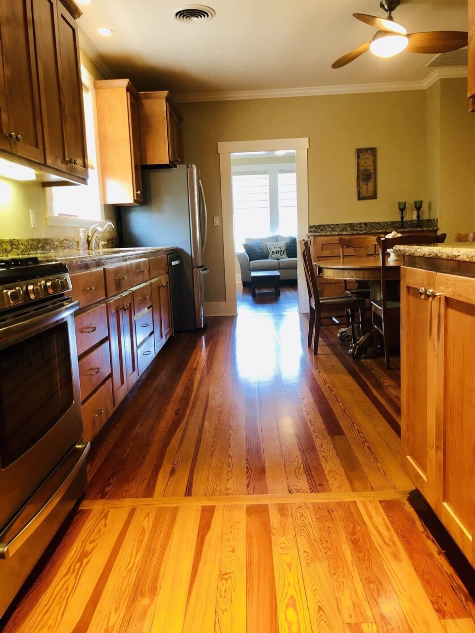 Chef's Kitchen has dishwasher, gas stove, microwave, & refrigerator.