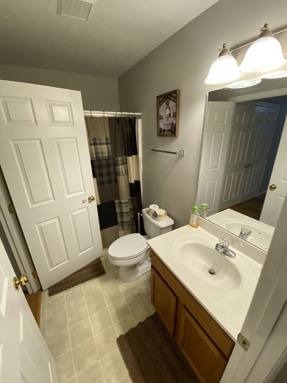 Bathroom off of front bedroom. Has a tub/shower combo.