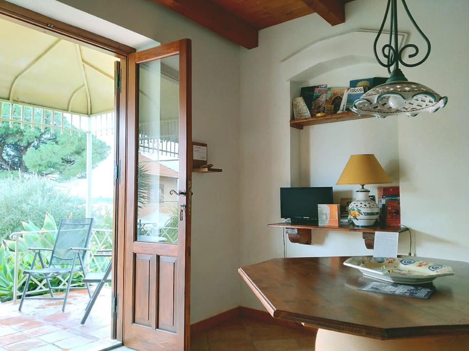 Living area. Lodge and dining area, library with TV