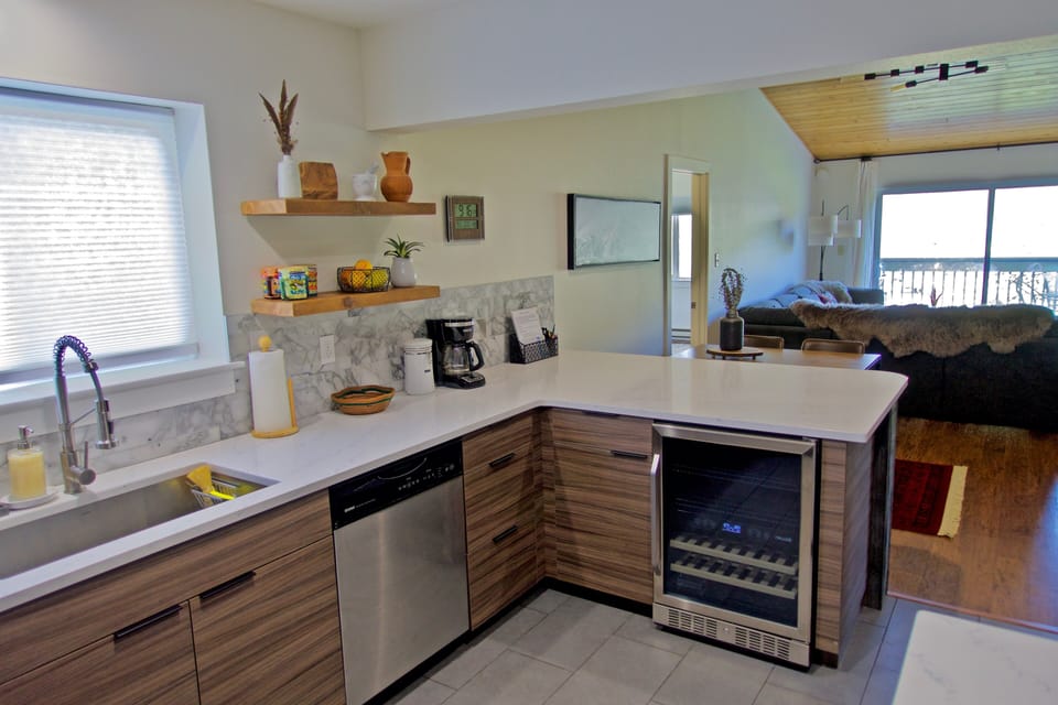 Luxury kitchen includes a beverage/wine cooler with dual temperature zones