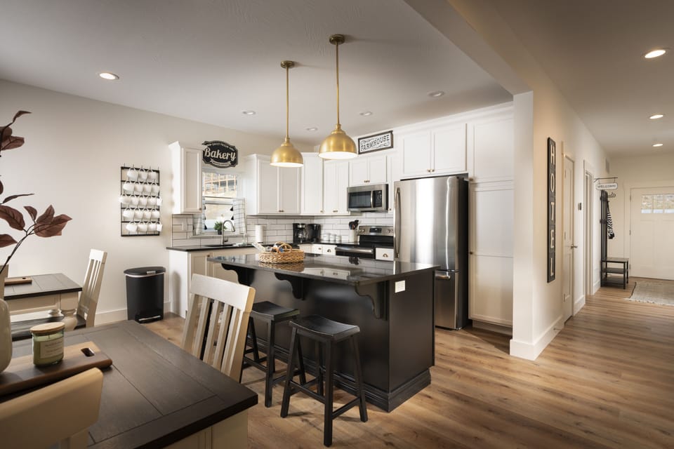 Grand open kitchen with granite counter tops, stainless appliances 