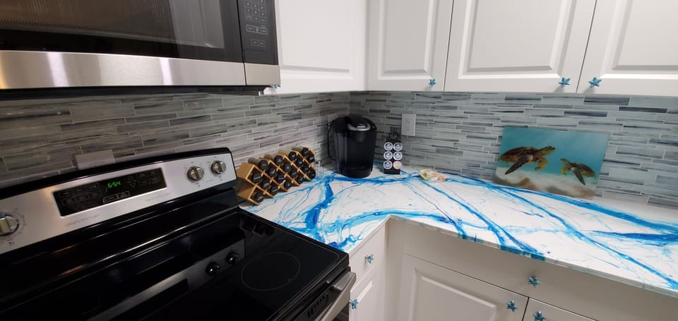 All of the appliances are new stainless steel units.