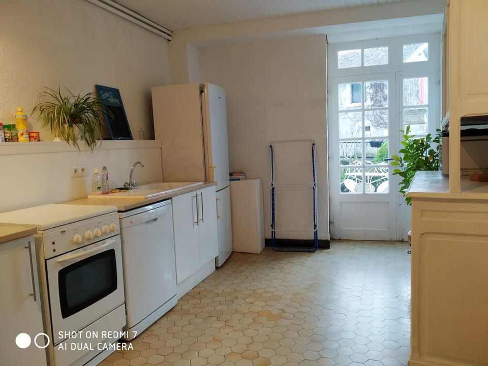 
The modern kitchen opens onto the sunny terrace