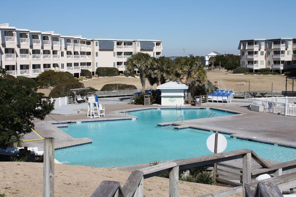 Outside pool with 100' water slide