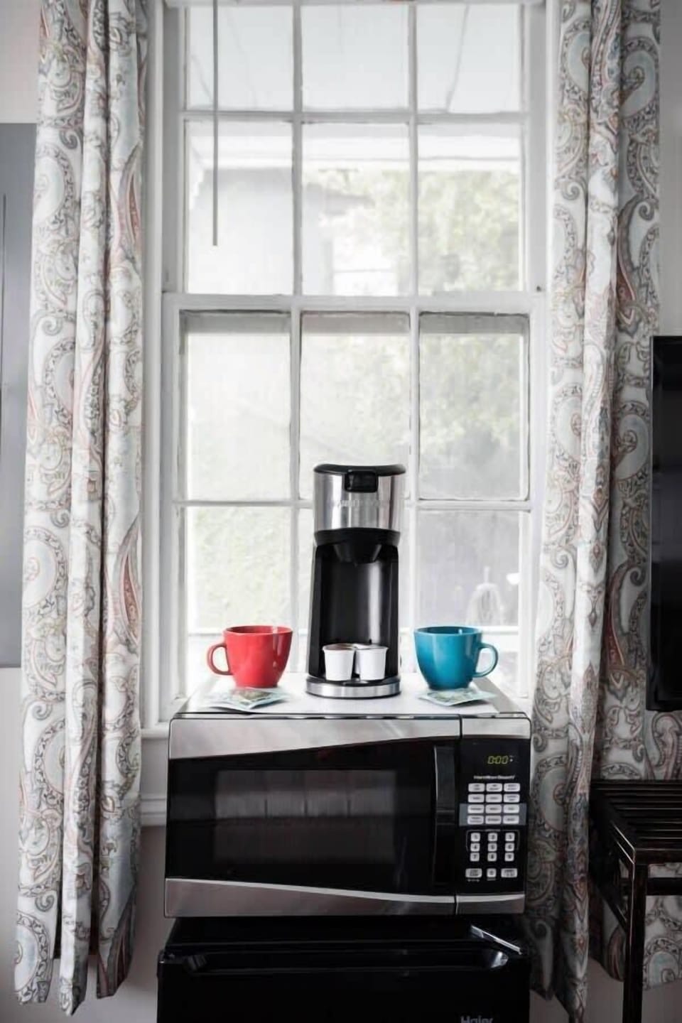 Coffee for early mornings and microwave for a quick snack