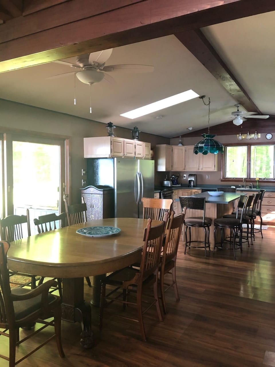 kitchen and dining area with walk out patio