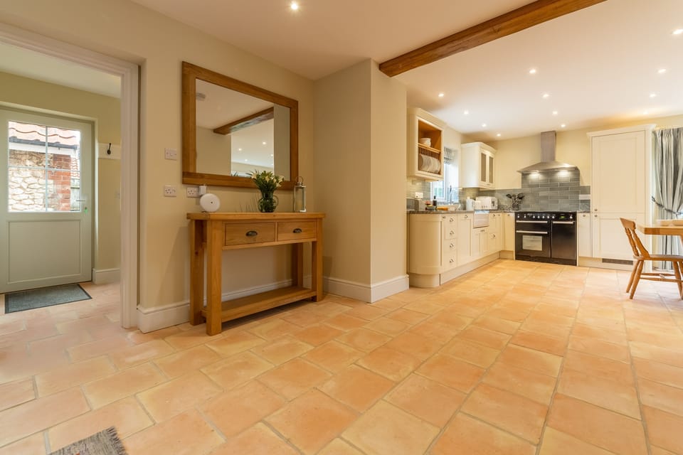 Ground floor: Snug looking to kitchen/ dining area