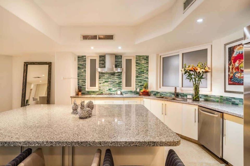 Fully equipped beach house kitchen with modern appliances
