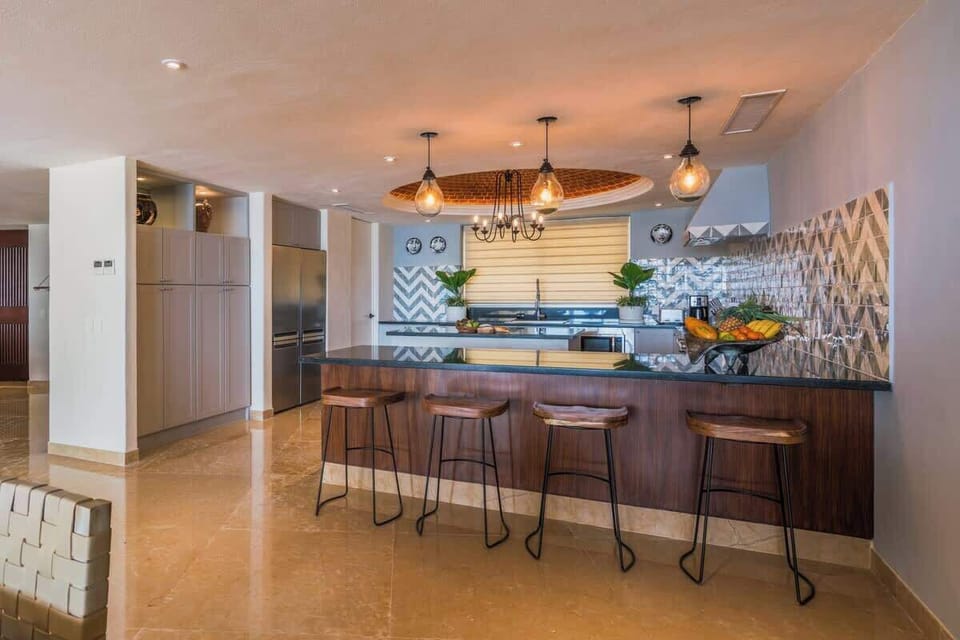 Fully equipped beach house kitchen with modern appliances