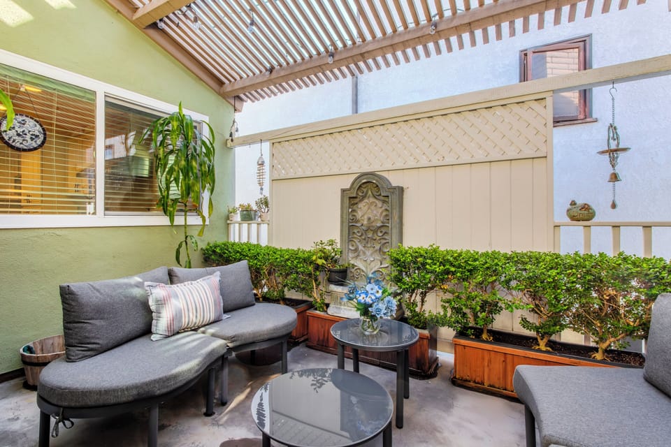 Patio (upstairs) is charming and inviting. 