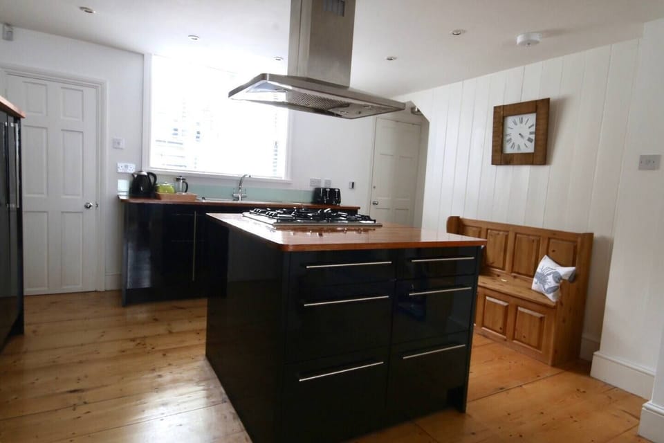 Kitchen island and seating perfect for socializing while preparing food...