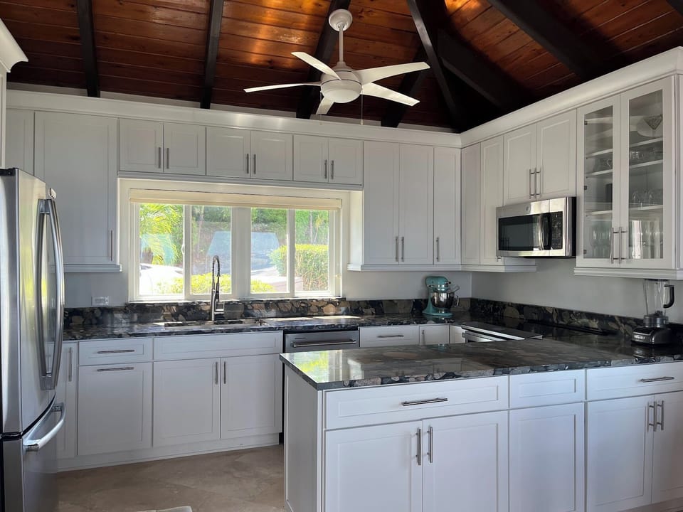 Upper Level - All-Clad pots and pans