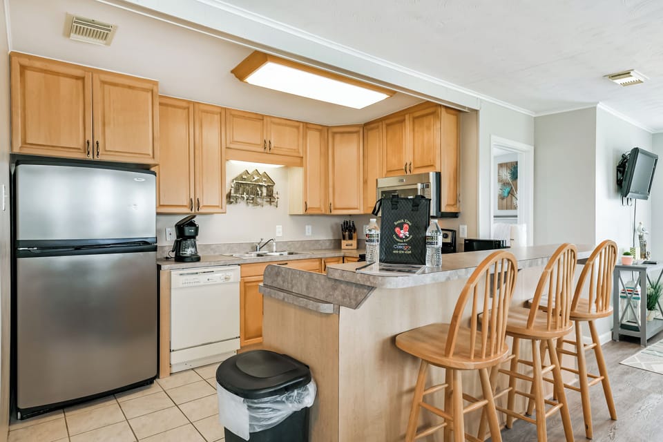 KITCHEN OVERLOOKING THE LIVING AREA