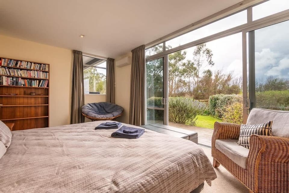 Master bedroom with Super King Bed and sliding doors outside