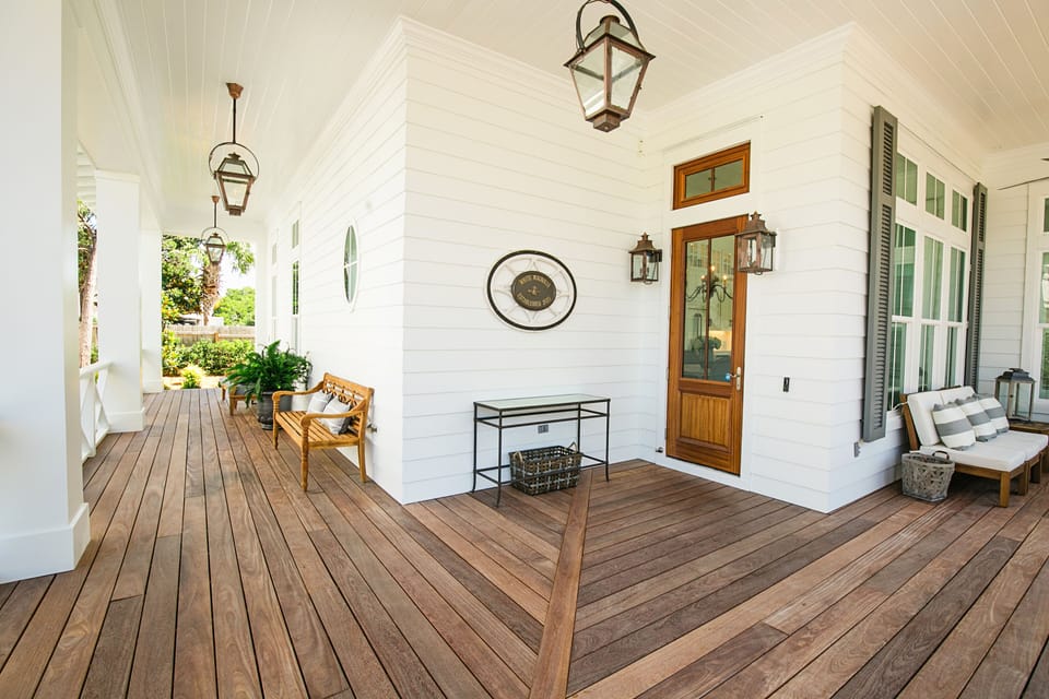 The dark-wood porch is the perfect touch!