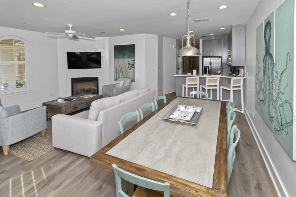 Dining room table seats 8 with 3 additional seats at the breakfast bar