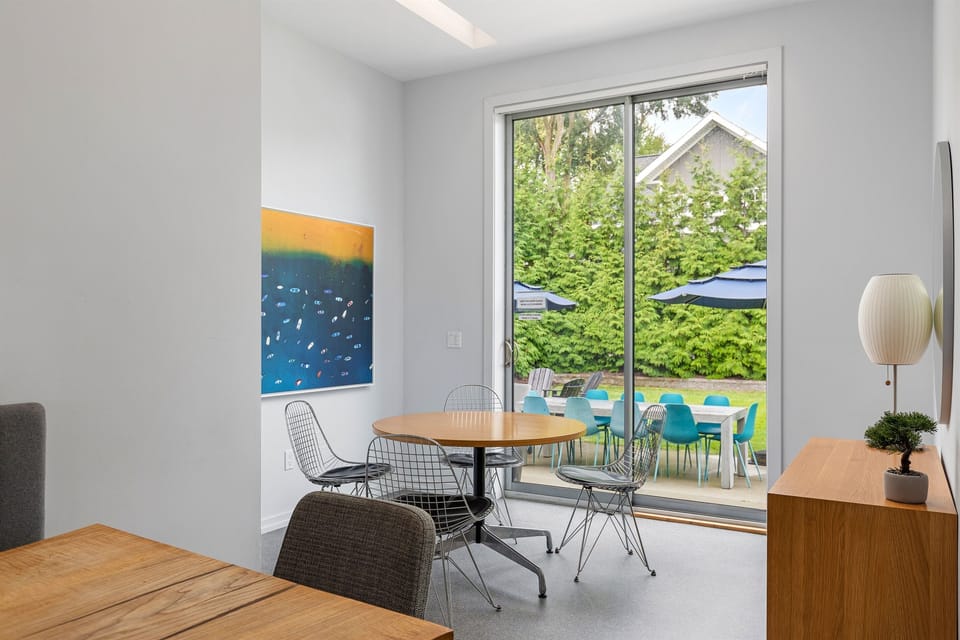 This dining nook with an additional dining table seats an additional 4 people, right next to the large table