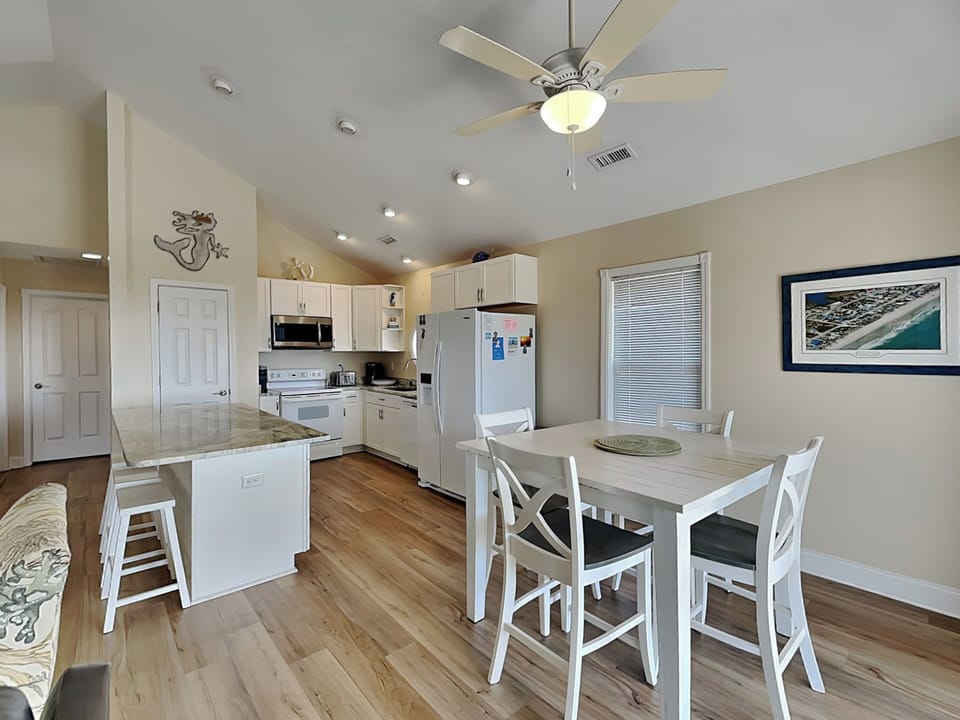 Fully Equipped Kitchen + Dining Area