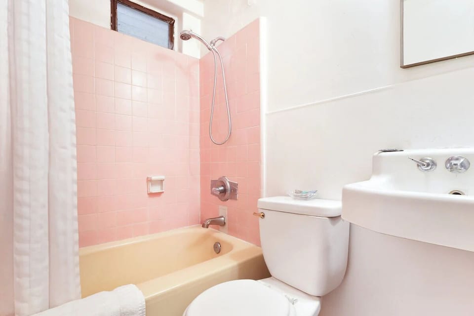 Refresh after adventures with a clean bath and shower combo.