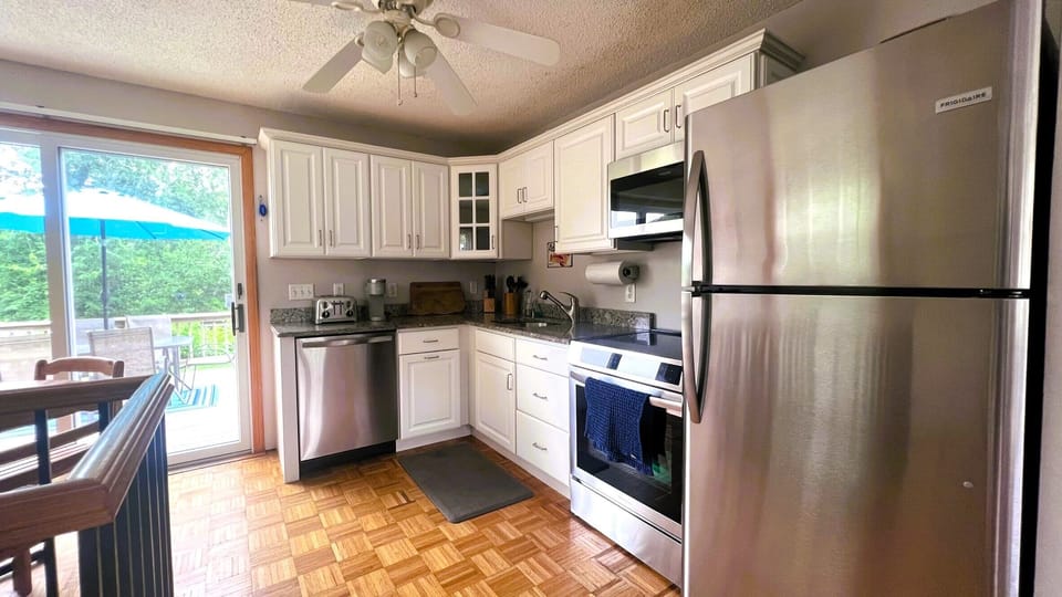 Kitchen appliances were just updated, including an induction range