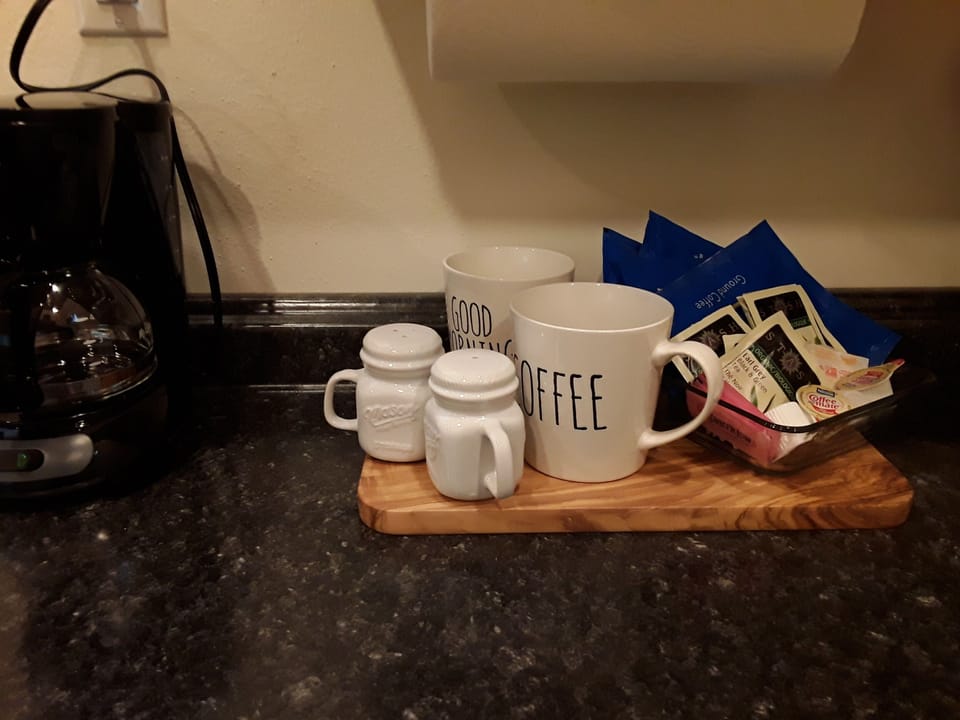Coffee, cream, sweeteners, all provided.