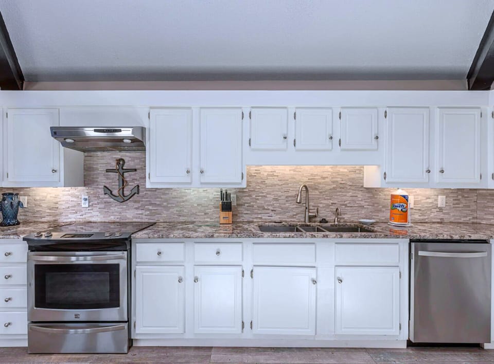 2nd Floor - Open-Concept Living Area: Spacious kitchen, dining area, and comfortable seating for gatherings.