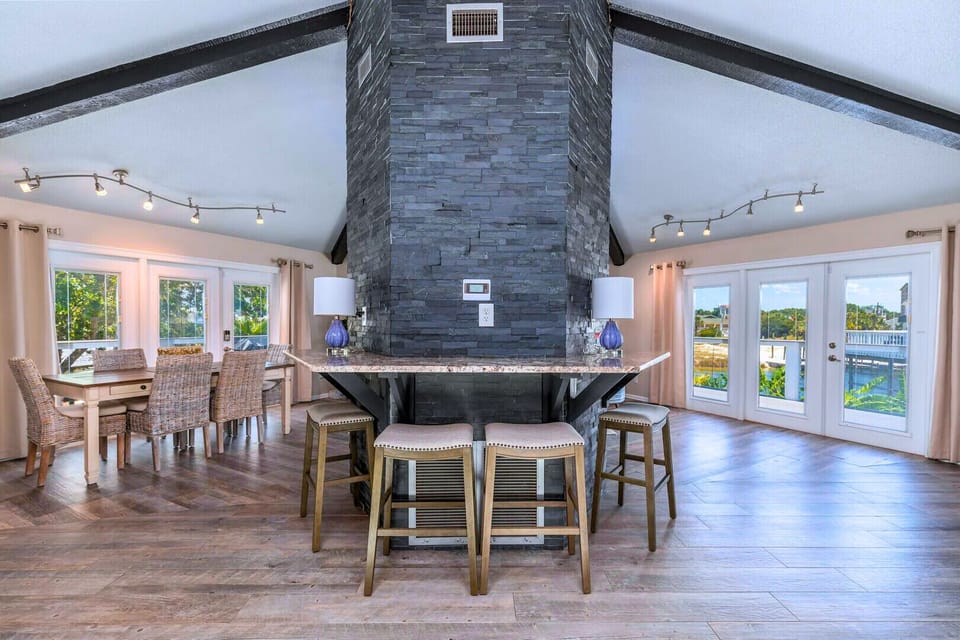 Open-Concept Living Area: Spacious kitchen, dining area, and comfortable seating for gatherings.