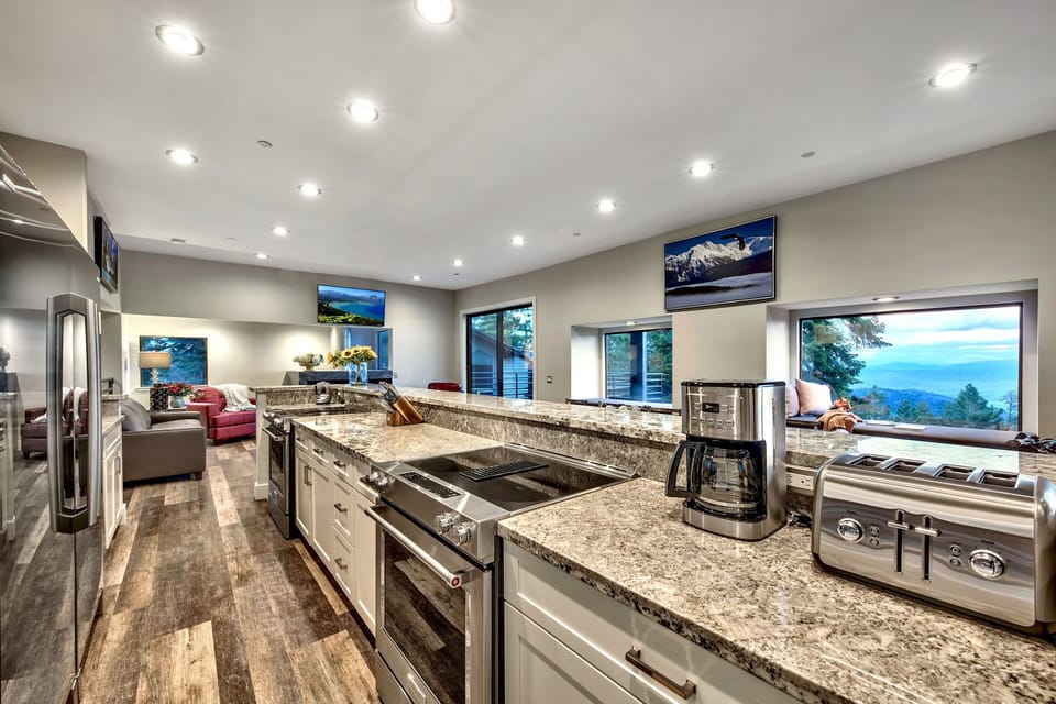 Above it all this VIP Blue Diamond  Mega Lodge is The Largest estate in Lake Tahoe
Two Fie Places and TV's with large entertaining area also two ovens and microwaves for the large family getaway or friend trip