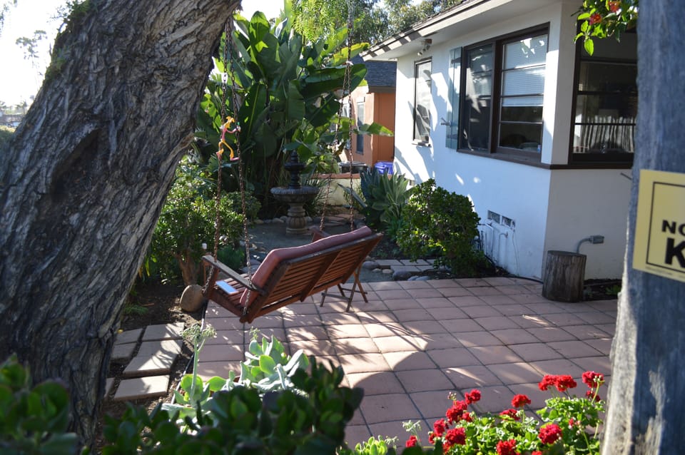 Swing or sit at the table to relax or dine