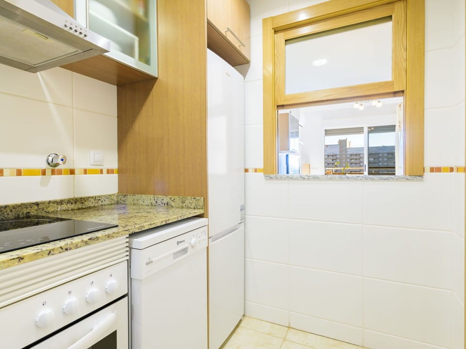Cabinetry, Property, Countertop, Kitchen Stove, Kitchen Appliance, Building, Wood, Interior Design, Floor, Window