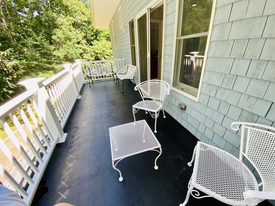 Await your guests on the front upstairs seating area