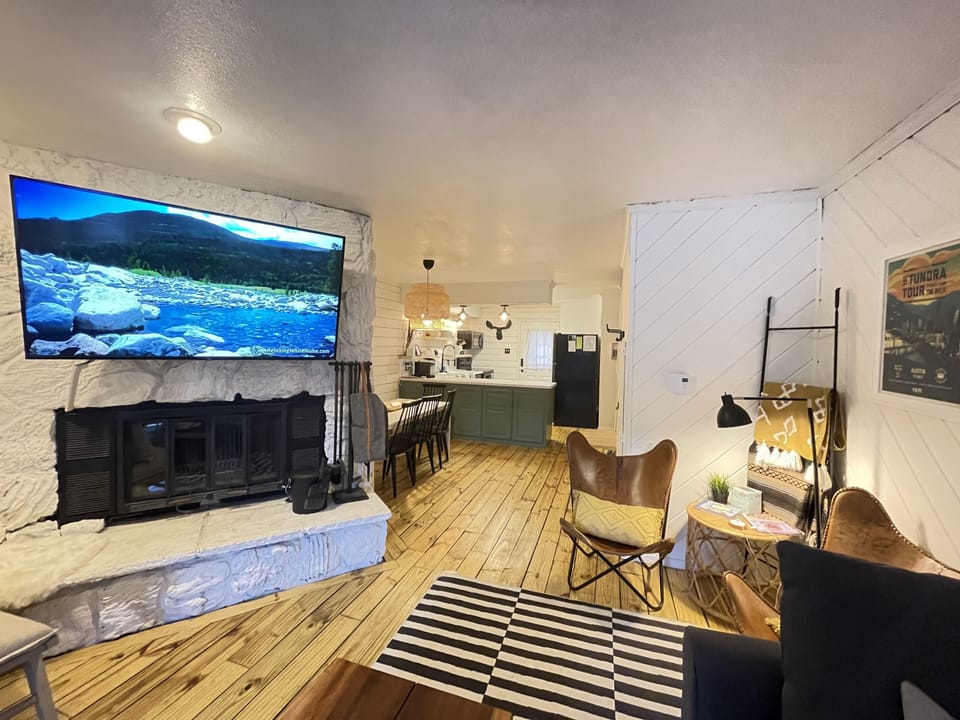 Living Room w/ Roku 65” TV
