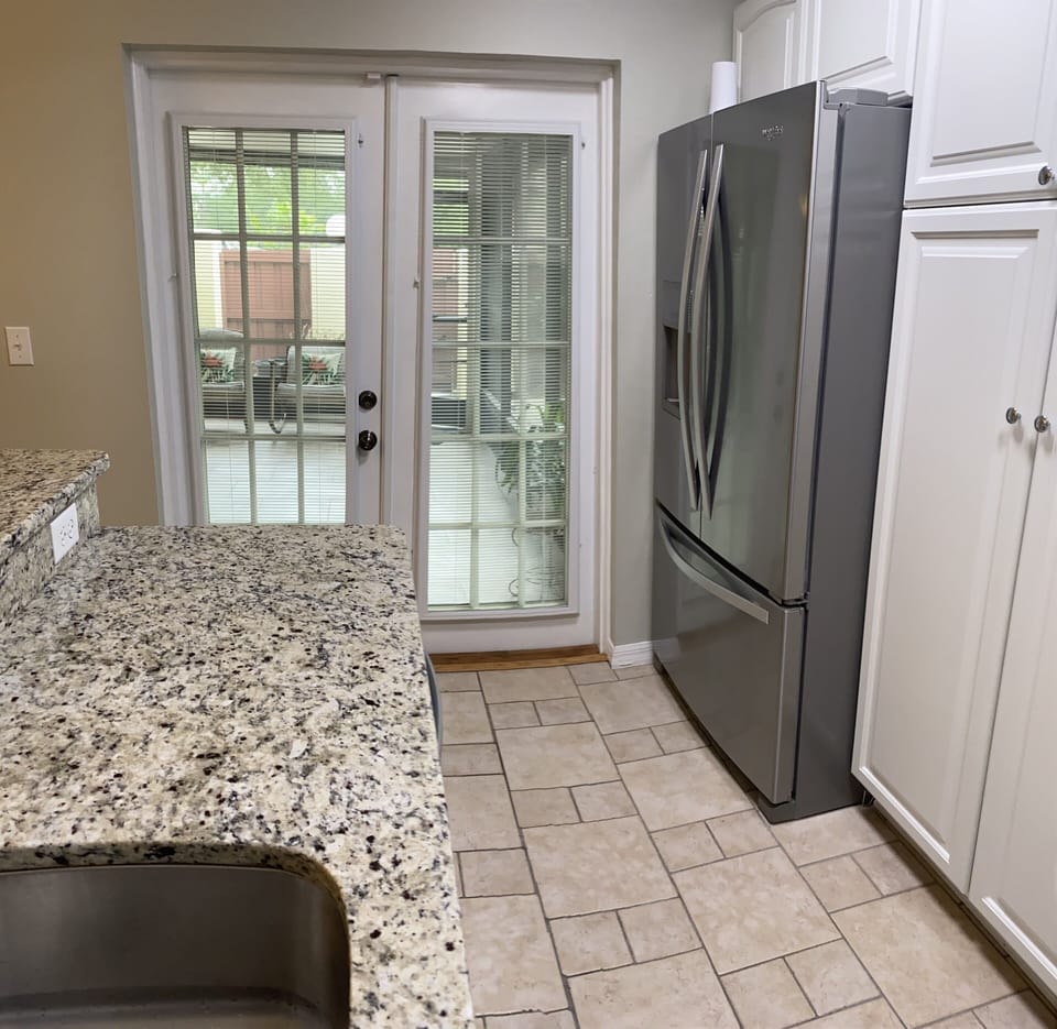 Kitchen with view of patio