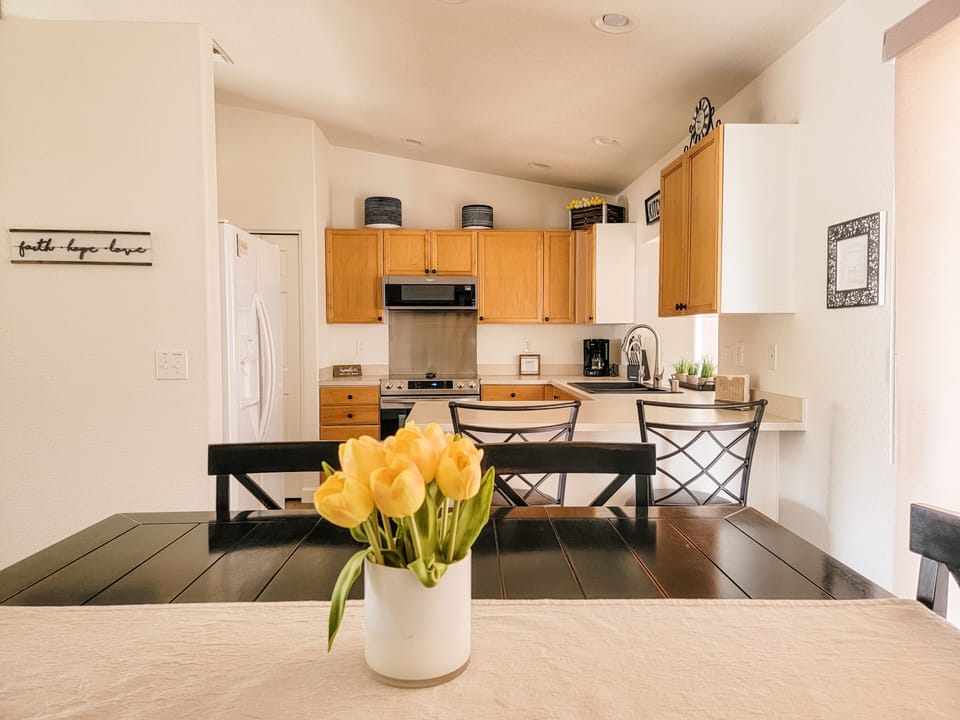 Dining Room table comfortably seats 6 | Breakfast Bar seats 2