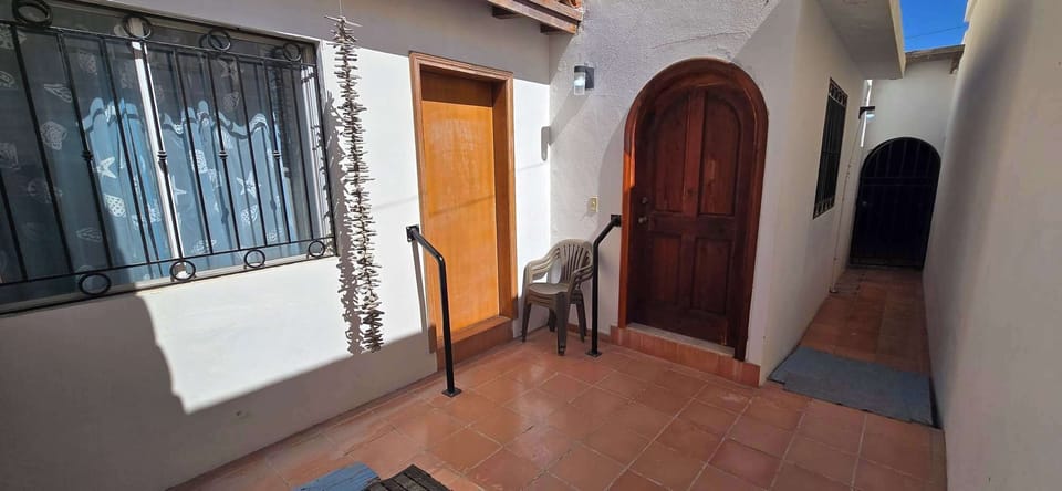 Access to laundry room and third bedrom 