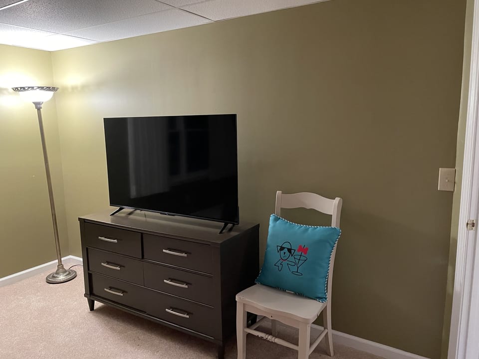 Lakefront Bedroom  #4 lower level, king bed, flat screen Roku TV. Drawer chest