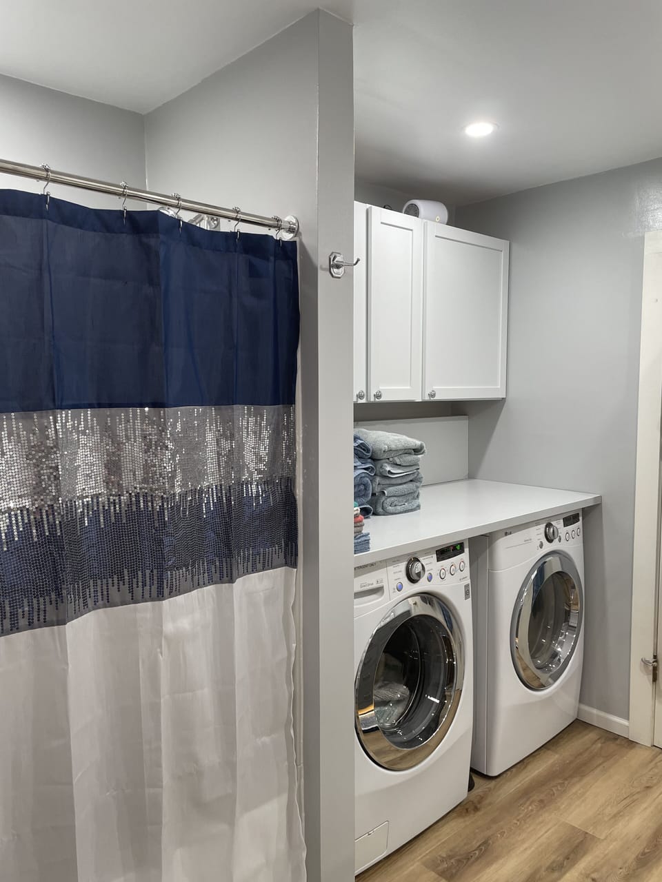 Laundry available for towels and bedding. Supplies are in cabinet above washer.