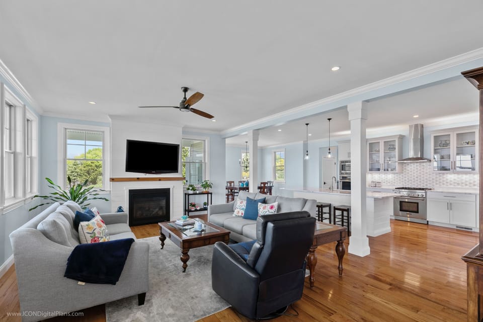 Family Room with gas fireplace and large flat screen tv.