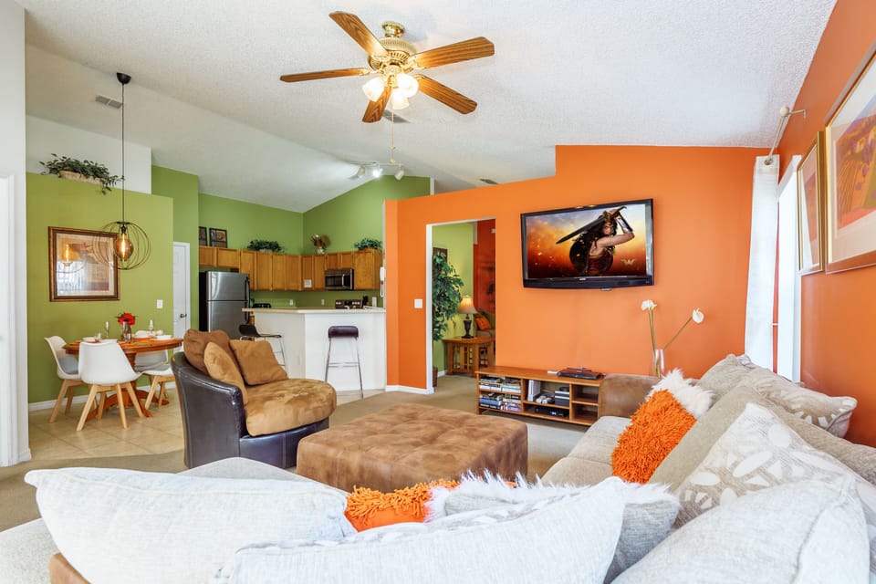 Family lounge with view to breakfast nook and kitchen