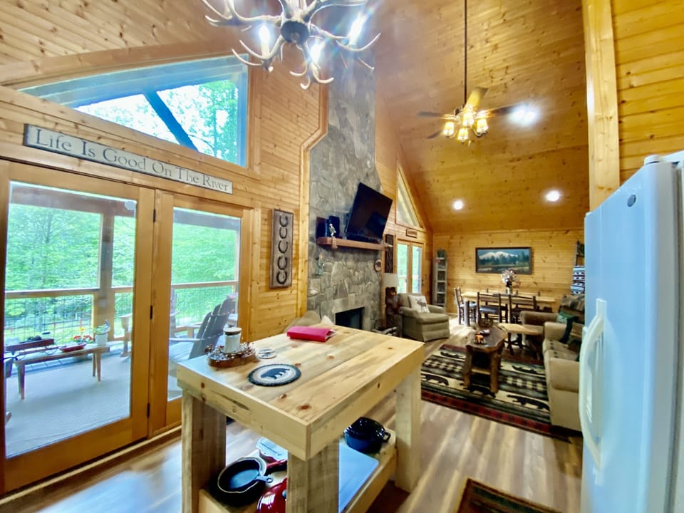 Kitchen view into living room and outdoor porch