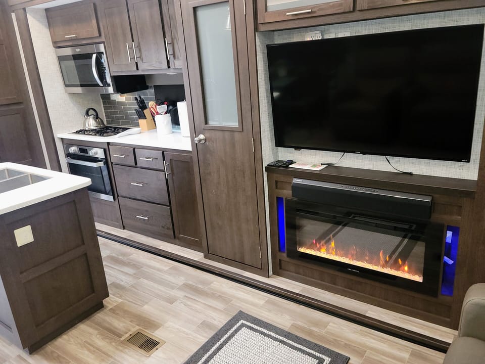 Fireplace makes the space very cozy with or without the heat turned on.